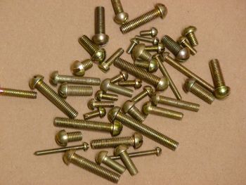 Semi-round screws