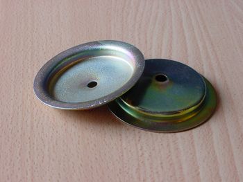 Air filter retaining plate