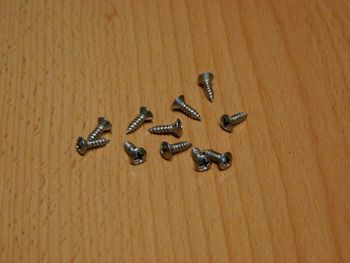 Lens head screw