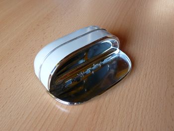 ashtray, coated, with crome ornamental strip & crome cap 