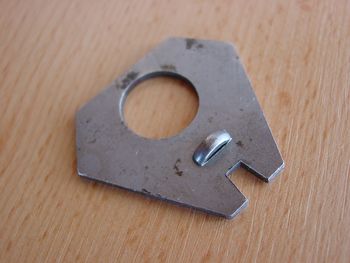 Spring fastener plate